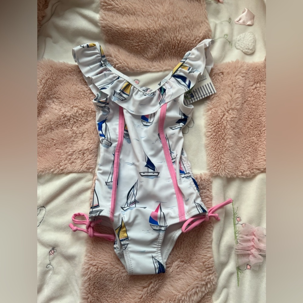 Blueberry Bay swimsuit
Toddler girl
2T
NWT